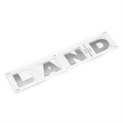 Land Rover "LAND" logo til kølerhjelmen på Defender fra 2007 og frem