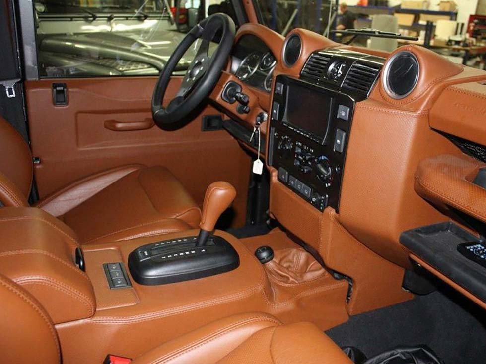 Defender Td4 med Cognac læder på alle paneler